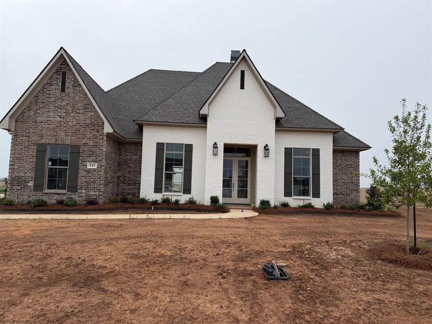 Beautiful new construction in Canal Place Subdivision offering 4 bedrooms, 3 baths, and 2,733 square feet of thoughtfully designed, one-story living. This open floor plan features spacious bedrooms, decorative lighting, and plenty of room to spread out and entertain. The eat-in kitchen is a standout with a large island, perfect for gatherings and everyday living. The remote primary suite provides a private retreat with a generous walk-in closet. Step outside to enjoy the outdoor kitchen—ideal for hosting year-round. Complete with a 3-car garage, this home blends style, comfort, and functionality in every detail.