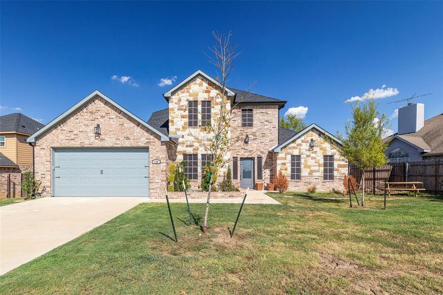 Welcome to your dream retreat in an exclusive lakeside subdivision — complete with a private pier for residents! This stunning 3-bedroom, 2.5-bath home effortlessly blends style, comfort, and breathtaking natural light.

Step inside and be greeted by soaring vaulted ceilings and expansive windows that flood the living spaces with sunshine. The primary suite is conveniently located downstairs, offering privacy and comfort. Its luxurious ensuite bathroom is a spa-like escape, featuring a separate soaking tub, custom tile work, and a walk-in shower that feels like a boutique hotel.

The open floor plan flows seamlessly for entertaining, while the upstairs bedrooms offer flexible space for family, guests, or a home office. Whether you're enjoying coffee in your bright breakfast nook or strolling to the community pier for an evening sunset, this home makes every day feel like a vacation.

Builder including a 1-2-10 Warranty