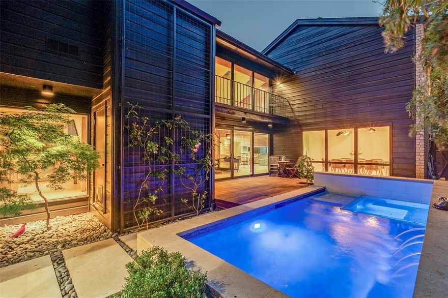 Completely reimagined in a custom 2023 renovation, this 6-bed, 3.5-bath Mid-Century Modern gem in Old Highland Park blends timeless design with modern luxury. Located on a quiet tree-lined street steps from the Katy Trail & Knox-Henderson, and zoned to Armstrong Elem. Open-concept living boasts vaulted ceilings, sleek gas fireplace & oak floors. Chef’s kitchen features European oak cabinetry, Wolf range, Bosch appliances, Japanese tile, 2 pantries, plus wet bar with wine cooler. Downstairs primary suite offers pool views, oversized walk-in spa like shower & closet. Upstairs includes a 2nd primary suite, 3 more bedrooms, flex 6th bed or office, full bath & loft. Zen-inspired pool, spa, Brazilian Ipe deck with gas grill hookup, & lush lawn ideal for entertaining. Surround sound inside & out. New windows, doors, plumbing, electrical, HVAC, tankless water heater & smart features. A rare turnkey opportunity in one of Dallas’ most coveted neighborhoods.