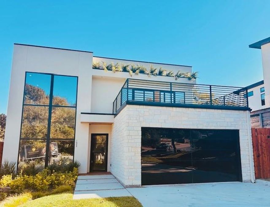 Welcome to 1622 Sylvan Avenue, a stunning new-construction home nestled in the lush, rolling hills of Kessler Park—one of Dallas’s most picturesque neighborhoods. Just minutes from Bishop Arts District and Downtown Dallas, this architectural gem blends timeless character with refined modern design.

Set on an expansive 0.29-acre treed lot, the home’s soft-modern style feels both warm and sophisticated. Expansive windows and tall ceilings flood every room with natural light, while smooth museum-finish walls and wide-plank white-oak floors create a clean, airy ambiance.

The chef’s kitchen features a commercial-grade gas range, a built-in counter-depth refrigerator, custom white oak cabinetry, designer tile, and luxurious countertops. The open kitchen-living-dining layout invites connection and entertaining, framed by a striking steel floating staircase and designer lighting throughout.

Upstairs, a second living area with a wet bar and beverage fridge opens to an expansive turfed rooftop deck—perfect for hosting friends or enjoying sunset views. The primary suite features a spa-like bath with imported stone, a frameless glass shower equipped with rainfall and body sprayers, a soaking tub, and a spacious custom closet. Each secondary bath showcases unique designer tile and high-end finishes.

Outside, enjoy a large backyard with a covered patio and ample space for a pool. Located within five minutes of the beloved Bishop Arts District, ten minutes from Downtown, Uptown, and the Arts District, and under 25 minutes to DFW and Love Field, this home delivers luxury, convenience, and style in one of Dallas’s most beautiful neighborhoods in Dallas.

Affordable modern luxury without compromise!