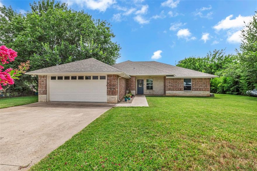 Welcome to your lakefront retreat on Lake Granbury and in the Ports O’ Call community—where comfort, lifestyle, and waterfront living come together.

This beautifully maintained 3-bedroom, 2-bath lake house offers the perfect blend of relaxation and functionality. Step inside to an open-concept layout filled with natural light, creating a warm and inviting space ideal for both everyday living and entertaining. The spacious living area flows seamlessly into the kitchen and dining space, making it easy to host family and friends after a day on the water.

The primary suite provides a peaceful escape with serene views, while the additional bedrooms offer flexibility for guests, a home office, or growing families.

Out back is your own private boat dock where you have direct access to the lake, perfect for boating, fishing, or simply unwinding at sunset. Whether you’re sipping coffee on the patio in the morning or gathering around in the evening, the outdoor space is designed to capture the beauty and tranquility of lake life.

Located in the desirable Ports O’ Call neighborhood, residents enjoy a quiet, established community with convenient access to Granbury’s shopping, dining, and historic square—giving you the best of both privacy and proximity.

If you’ve been searching for a place to slow down, spread out, and enjoy waterfront living—this is it.