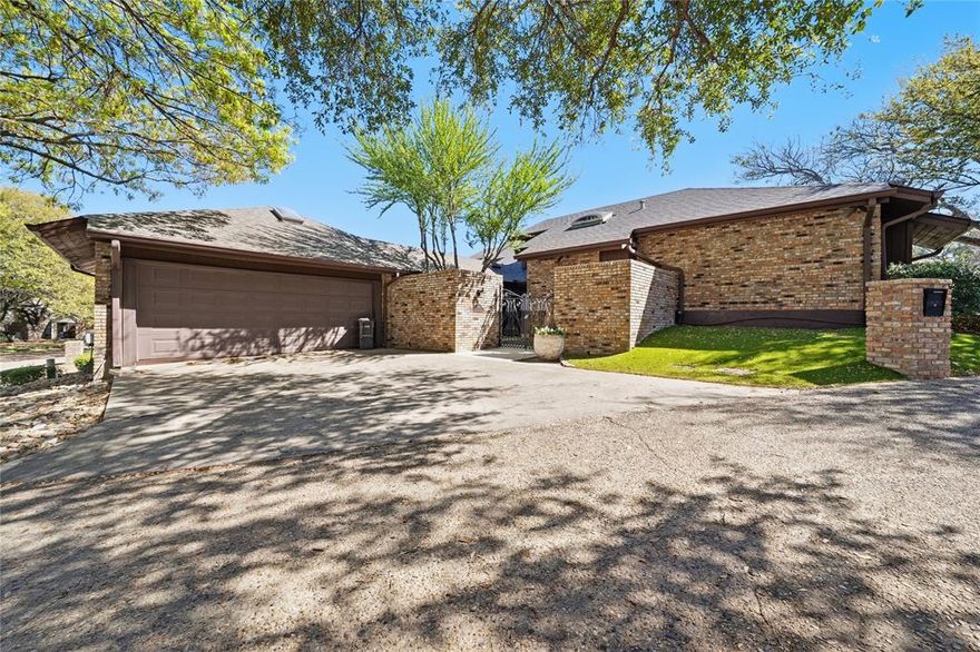Highly sought after gated community on the west side of Fort Worth, this one-of-a-kind residence blends timeless character with thoughtful updates. Built in the 1970s, the home showcases distinctive architectural details you won’t find in today’s new construction—creating a truly unique living experience.

Natural light pours in through multiple skylights, highlighting the spacious living area with its soaring ceilings, exposed wood beams, and a striking floor-to-ceiling brick fireplace that serves as the centerpiece of the home. A dramatic black spiral staircase leads to a versatile loft space featuring a built-in bookshelf—perfect for a home office, reading nook, or creative retreat.

The interior continues to impress with tile flooring, along with a mix of track and spotlight lighting that adds both style and functionality. Step outside to enjoy a private, gated courtyard entry—ideal for morning coffee or a quiet outdoor escape.

Major updates provide peace of mind, including foundation work completed in 2023 and both HVAC systems replaced in August 2025.

This is a rare opportunity to own a character-rich home with modern improvements in a desirable Fort Worth location—perfect for those who appreciate design, charm, and low-maintenance living.