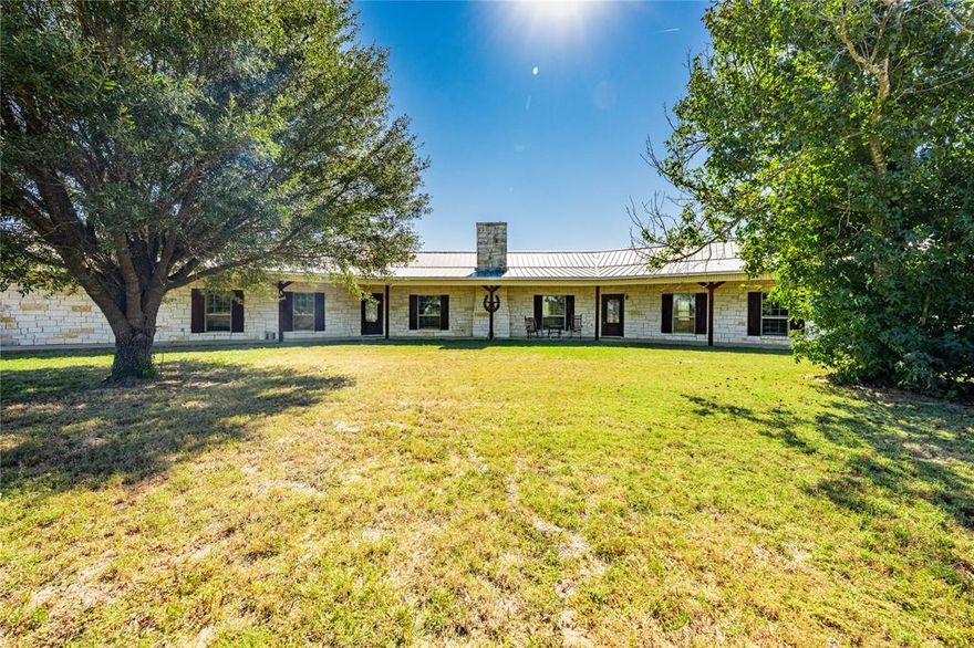 Charming Country Retreat on 5 ± ACRES with Modern Comforts! Escape the hustle and embrace peaceful country living in this beautifully maintained 3-bedroom, 2-bath home on 5 scenic acres in beautiful East Texas. Built in 2004, this 2,074-sq-ft home combines rustic charm with modern upgrades — featuring a welcoming open floor plan, vaulted ceilings, and decorative lighting throughout. The spacious kitchen is the heart of the home, complete with granite countertops, a large island, walk-in pantry, and gas cooktop — perfect for family gatherings or entertaining friends. The primary suite offers a true retreat with a spa-like ensuite including a garden tub, separate shower, and dual vanities. Enjoy cozy evenings by the wood-burning fireplace or unwind on the rear deck overlooking peaceful country views. Outdoors, you’ll find a barbed-wire and pipe-fenced property with a 30x25 3-bay metal building, 10x16 storage building with AC and electric, and plenty of room for horses or hobbies. The land provides ample space to roam, garden, or simply relax by the fire pit under the stars. Additional features include a metal roof, stone and siding exterior, 2-car garage, and low taxes with NO HOA! Conveniently located just minutes from downtown Grand Saline and within easy reach of Canton, Mineola, and Tyler — this property offers the perfect balance of privacy and accessibility. Bring your rocking chairs and enjoy the sunsets — this East Texas gem is ready to welcome you home!