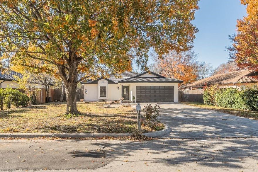 Beautifully updated house with freshly painted exterior stucco and Spanish tiled roof  . This property impresses from the start with stunning curb appeal with mature shady tree. Located in an excellent neighborhood within 5 mins to Costco, Arlington Parks Mall, Highland shopping center and multiple restaurants. Updates November 2025, includes new interior texture and paint, new flooring throughout. Updated Bathrooms with granite countertop, new hardware fittings, new surround tiles, new bathtub and new shower stall. Updated Kitchen with granite countertop, new hardware fittings, backsplash and new SS appliances. Decorative lighting, new fans and some new doors. Nice Utility room inside. Foundation repaired with Engineers report and transferable warranty. Enjoy the enclosed sunroom offering year round enjoyment of natural light and views. Property backs up to an easement which makes it private and quiet. The long back deck with new fence is ideal for sitting, entertaining or lounging.