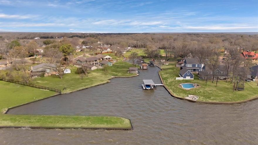 Cedar Creek Lake is a flourishing area which means owning property here now could inherit the benefits of population growth and infrastructure nearby.  The land is situated in the central part of the lake and only a few miles from public boat ramps, shopping, and entertainment. The lake is one of the largest in Texas and offers exceptional fishing and recreational boating. This large waterfront tract features two contiguous empty lots, and is on the end of a cul de sac! This is a wonderful opportunity to own property that allows for not only private access to a superb lake, but to also join a high quality community. Prestige Point is a very charming established neighborhood with only 33 total lots. Most lots have already been built on. Pride of ownership is obvious throughout this gated and well-maintained waterside community. If you have general questions about home building restrictions or dock construction for this community, please call the listing agent. Kemp is conveniently located about 45 minutes from Dallas and an hour from Tyler. The well-known Canton Flea Markets, also called First Monday Trade Days, are a short drive away.