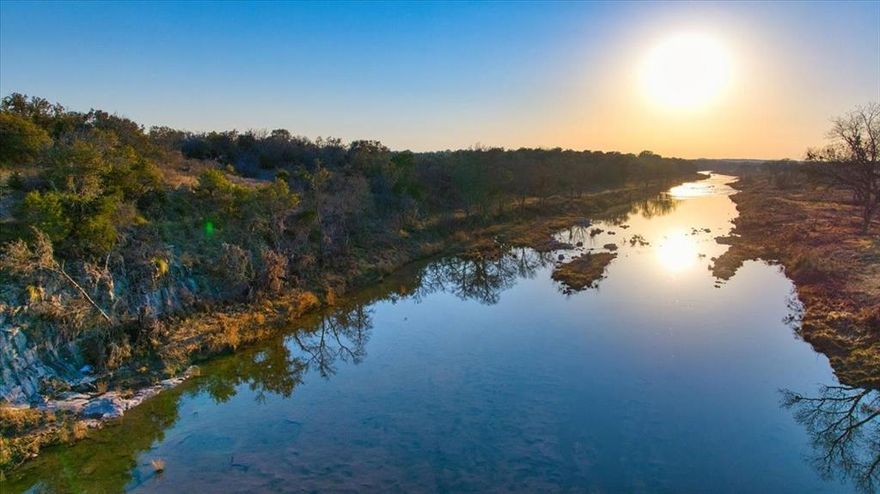 The High View River Ranch is your opportunity to own a remarkable live water piece of Texas real estate! This 115 acre ranch boasts 3800+ feet of San Saba river frontage and offers multiple hilltop views of the beautiful Heart of Texas area. It is located in Voca,TX on Highway 71 between Llano and Brady making it a perfect gateway to all that central Texas has to offer. The terrain features rolling elevations that vary from a low of 1500 feet along the water, to highs of 1590 feet, creating scenic meadows and huge views throughout. Ancient Live Oaks, Shin Oak, native Pecan and Mesquite trees create private park-like settings along the riverbanks. The ranch is rectangular in shape and fenced on 4 sides with two entrances from Highway 71. Agricultural exemption for property taxes, electricity and a water well (100gpm) are already in place. Access to portions of the river have recently been cleared, as well as a roadway across the length of the ranch for ATV and vehicle travel. Wear your boots and be ready to explore the various features this unique property has to offer. Hunting, fishing, swimming and searching for arrowheads are a few things that come to mind. Recreational use, residential or event venue- make this peaceful 115 acre ranch the idyllic river ranch you've always wanted. The owner has taken careful consideration to reveal the possibilities this ranch has to offer, the rest is up to you! Located in Voca, TX (McCulloch County) : 13 miles from Brady, 59 miles from Brownwood, 67 miles from Fredericksburg and 115 miles from Austin.