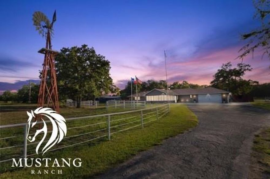 Attention equestrians, 4-H enthusiasts, and animal lovers! This stunning 19.8± acre ranch offers the ultimate country living experience. Featuring 6 bedrooms, 4.5 bathrooms, over 4,100 square feet, and a 2-car garage, this property has been designed for comfort and convenience. The home boasts an open floor plan, modernized with top-to-bottom updates completed in 2020, combining style and functionality. The kitchen, complete with natural lighting and updated finishes, flows seamlessly into a bright living area, while the primary suite impresses with an oversized layout, spacious closets, and luxurious ensuite. Additional bedrooms are well-sized for comfort and flexibility. For extended family or guests, enjoy a separate living area with its own kitchenette and private entrance—perfect for multi-generational living. Step outside to discover everything a horse enthusiast dreams of: round pens, a stud area with 20x20 stalls, wash racks, a loafing shed, working cattle chutes, and reseeded front pastures for optimal grazing. The back section of the property includes riding trails nestled among gorgeous Texas timber that opens into expansive grazing areas for cattle or horses. There’s also a small fishing pond and plenty of open space for recreational activities. Functionality extends to the property’s infrastructure, featuring a fully fenced layout, a large workshop with a bathroom, and additional space for future storage or expansion. Solar panels enhance energy efficiency and keep utility bills in check. Relax on the screened-in porch, soaking in peaceful views of your land. Located in the Kaufman County ISD, this ranch offers convenient access to Kaufman, Canton, and the Metroplex via I-20. Schedule your showing today—this property is where country serenity meets practicality!