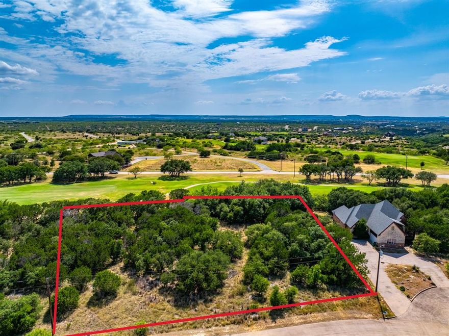 Two Prime Golf Course lots in The Cliffs Resort at Possum Kingdom Lake. Build your dream lake retreat on these two adjoining golf course lots totaling approximately 0.704 acres, ideally situated on Hole #2 T-Box of The Cliffs Championship Golf Course. Enjoy panoramic golf course views from two side-by-side lots and the flexibility to design a spacious custom home on nearly an acre of land within one of PK's most prestigious gated communities. As a property owner in The Cliffs, you'll enjoy HOA benefits including, 36 rounds of golf per year on the award-winning course, access to two community pools, tennis courts, on-site VIP marina, restaurant and bar, private beach area, fitness center, hotel discounts, 24-7 guarded and gated security. Utilities are available at the road, and there's no timeline to build. This is a rare opportunity to own two of the best located parcels in the community. Lots are located in phase I with concrete streets. Whether for investment, full-time living, or a weekend getaway, this property delivers. Seller is a licensed Realtor.