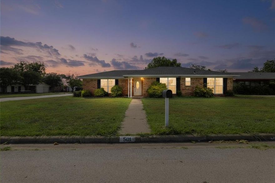Well-maintained 3 bedroom, 2 bath mid-century home situated on a large corner lot in a desirable closed-circuit neighborhood with only one way in and out. Interior features include a spacious living room with brick fireplace, ample kitchen, Nest thermostat, and a flexible room ideal for formal dining or a den. The split Jack-and-Jill bath serves the two guest bedrooms, while the primary suite offers its own private bath. Exterior highlights include a covered back patio, sizable privacy-fenced backyard, side-entry 2-car garage, Ring security camera system, and Ring doorbell that convey with the property. Conveniently located next to the high school and within walking distance to Walmart and nearby retail.