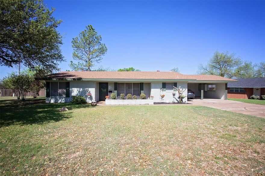 Welcome home to comfort, charm, and community. Just minutes from the excitement of Friday night lights at the Graham High School. Situated on a spacious corner lot in a desirable neighborhood, this inviting 3-bedroom home offers easy living in a setting that feels like home the moment you arrive.
Inside, you’ll find a versatile sunroom that can serve as a home office, playroom, or additional living space to fit your needs. The kitchen features a unique 1960 antique Frigidaire gas double oven and stove, adding timeless character, along with a new dishwasher and updated air conditioning for modern comfort. Step outside to a large, fenced back yard with plenty of room to relax, entertain, or play, plus a convenient storage building. Well-maintained, move-in ready, and full of charm. This is a wonderful place to call home.