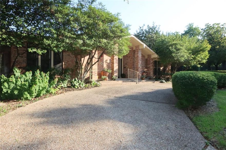 One of Northcrest’s most exceptional homes—offering 4,102 sq ft of beautifully maintained living space in one of Fort Worth’s most desirable upscale neighborhoods, just minutes from Downtown Fort Worth and TCU. As the largest home in the subdivision, this rare property combines luxury, flexibility, privacy, and income-producing potential in one remarkable package.

Step inside to rich hardwood floors, abundant natural light pouring through oversized windows with plantation shutters, and a warm open concept  designed for both elegant entertaining and comfortable everyday living. The spacious kitchen is a dream for gatherings, featuring an oversized island, extensive cabinetry, lazy Susans, abundant pantry storage, kitchenette area, and a flexible space perfect for formal dinners or casual mornings at home.
The downstairs primary suite offers a true retreat with a spa-inspired bath featuring a jetted soaking tub, separate shower, dual walk-in closets, and exceptional built-in storage. A second downstairs bedroom with a private bath and built-in bookshelves creates the perfect guest suite, office, or multigenerational living space.
Designed for entertaining, the stylish bar area with wine cabinet and sink makes an ideal game room, lounge, or second living area. The majority of the home is conveniently located downstairs, while the upstairs can function independently with its own private entrance, separate AC unit, hot water heater, full bath, kitchenette, and two additional bedrooms. Perfect for Airbnb income, rental opportunities, extended family, or private guest quarters.
Outside, enjoy added privacy with a gated driveway, circular drive, and attached 2-car garage. With incredible storage throughout, flexible living options, and meticulous maintenance, this home delivers a rare combination of space, comfort, and versatility in a premier Fort Worth location.
Schedule your private showing today.