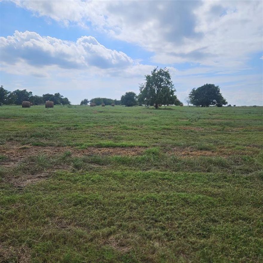 BACK ON MARKET !!!! Discover the perfect blend of open space and natural beauty with this 13 acre tract. Property offers plenty of room to roam, farm or build your dream home. Enjoy peaceful country living. Utilities available nearby, ready for your vision to take shape. NO HOA!.