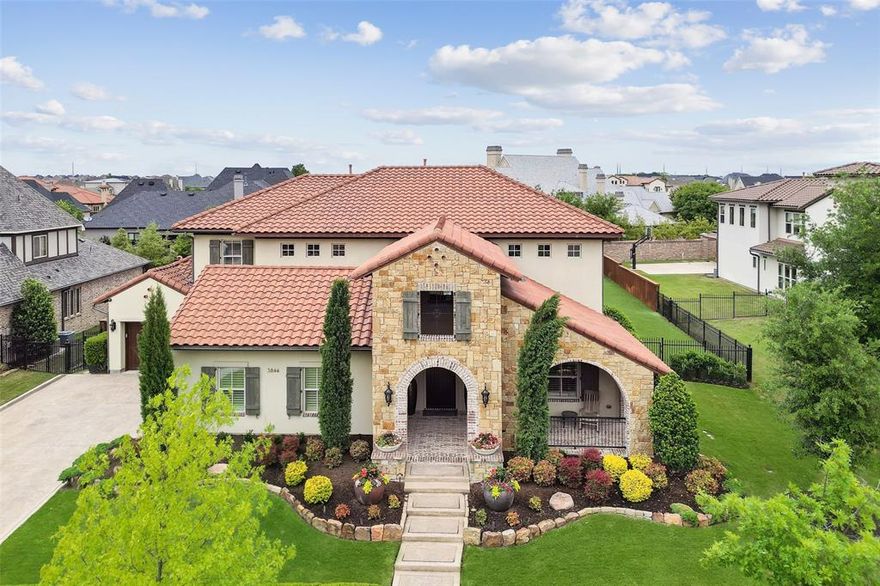 Extreme luxury with attention to detail in this stunning Darling Home in the prestigious Newman Village gated community. Watch gorgeous TX sunsets on the front porch. Inside experience the vaulted entry leading to the heart of the home showcasing wine room, multiple dining areas, gourmet kitchen quartz countertop, large island, stainless appliances, and refrigerator. Large living area with wall of window views to resort-style backyard. Media, half bath, oversized mudroom with pet kennel, built in storage, and desk. Main level boasts 2 bedrooms down; primary with sitting, spa bath and private covered patio. Guest bed with full bath, built in desk-murphy bed combo. Upstairs game room overlooks main living plus 3BD, 3BA. The backyard is an entertainer's dream. Oversized pool spa with fire feature, spacious patio with fireplace, outdoor kitchen; firepit, bocce court, turfed yard. Main home 4913 sqft + additional 461 sqft pool guest house with full bath and closet. Much more to experience.