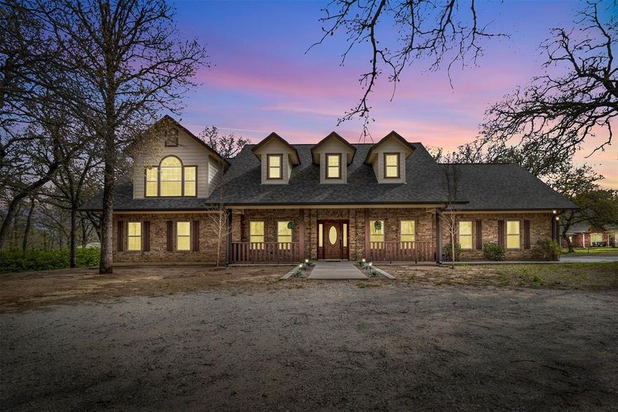 This handcrafted home built by a local custom builder Larry Hulsey is outside city limits & a must see! Enter through the gated entrance around your personal circular drive or extended driveway leading to an oversized 2 car garage where you can't help but look up at your own cleared out forest of Oak tree's surrounding you on 2.28 acres of endless views of green pastures! This custom-tailored home features an open floor plan with 2 living, 2 dining areas, 3 HVAC units, 2-750 gal septic tanks (pumped 2022), 2-50 gal water heaters, geometric vaulted ceilings, crown molding, plenty of interior & exterior lighting, skylights, spacious rooms, & 2X12 & 2X8 construction with 10ft walls & 8ft doors minimizing noise & the cost of utilities! The kitchen comes complete with pantry, customized cabinets with pull outs & island with sink & reverse osmosis! The primary bedroom on the 1st flr comes with an ensuite bath, walk in closet, 3 vanities, jetted tub & shower! You won’t want to miss this one!