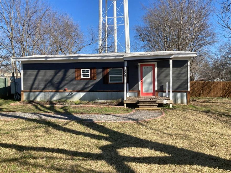 Welcome to 307 W Sherman St., located in the heart of Bells, Texas and its highly desired School District. With 3 bedrooms and 1 full bath, this home offers a strong foundational layout for family living, investment, or a stylish renovation. The Metal roof and wood siding construction lends timeless curb appeal, while the location provides additional yard space with plenty of room for a garden in the back, and a sense of openness. This home is offered AS-IS but it is very livable in its current state with newer vinyl pane windows, metal roof, and central HVAC system. Whether your vision is cosmetic refresh (paint, flooring, fixtures) or a more robust remodel (kitchen, bathrooms, perhaps structural or systems updates), the structure and footprint appear to be solid. For an investor, renovator, or homeowner ready to personalize, this property presents significant upside.
