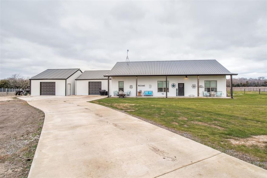 MOTIVATED SELLERS Beautiful 3br 2ba custom built modern farmhouse tucked at the end of a cul de sac, in a quiet rural subdivision. This home sits on 7.5 acres, includes a 650 sf barn w 3 rollup doors and a newly built 30x24x12 garage. Treed lot w creek on back of the property and 670 linear ft pipe fence. The house has great living space featuring an open floor plan, large kitchen island w farm sink, private master suite with a large closet, an office, and a huge game room with epoxy flooring. The game room can also be used as another garage. There are custom fitted blackout shades on all windows throughout the house. This property is a MUST see.