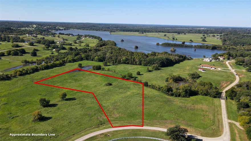 Approx. 5 acre lot in the beautiful, restricted, and gated Waters Edge Ranch. Property owners can take advantage of the private approx. 328 acre lake, community pool, boat launch, and RV park for property owners. Water and electricity are available at the road while a septic tank would be needed. With great views, great space, and great location, this property has a lot to offer. Perfect space to build your dream home!