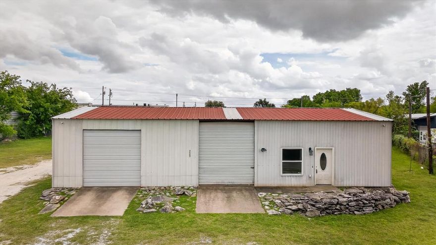 What a deal! This unique property can be used as either commercial or residential. Perfect set up for a work from home business. This property boasts a half acre of land, 1800 sqft building, complete with full live in area including 2bed-1bath, full kitchen and living room, one large carport, and two garages. Plenty of parking and room to run your business. Building has a metal roof. Refrigerator included in sale. Air conditioner was replaced in 2024 with a 2.5 ton unit.  Low taxes! Property to be sold as is.