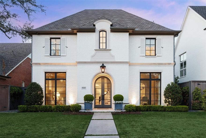 This exquisite University Park custom home built in 2016 by Platinum Series Homes w open flr plan offering blend of traditional charm & modern luxury. Hardwoods throughout, floor-to-ceiling windows, designer wallpapers-drapes, beautiful fireplaces. 1st flr boasts stunning foyer opening to study & dining room. Kitchen ft large island, gourmet appliances, walk-in pantry, flowing into large family rm w marble FP & French doors opening to outdoor living area. Guest bd w ensuite ba also located on 1st floor. 2nd flr incl primary suite which offers marble floors, oversized shower, and custom walk-in closet. Two add. bedrms w ensuite ba, game rm, and laundry rm. 3rd flr ft 5th bd with ensuite ba & walk-in closet. Outdoor living area incl. covered porch w fireplace & retractable screens, turfed backyard w landscaping by From the Ground Up, & attached 2-car garage. Minutes from Snider Plaza, Preston Center, and University Park Elementary, this home embodies luxurious living in a prime location.