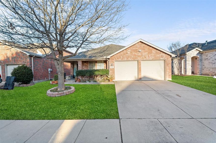 Welcome to this clean, well maintained home in the desirable Liberty Crossing community of North Fort Worth. Offering over 1,800 square feet, this home features a spacious living room with a cozy fireplace that opens seamlessly to the kitchen perfect for everyday living and entertaining. The thoughtful layout includes 3 bedrooms and 2 full bathrooms, with a private primary suite featuring a walk in closet and a separate soaking tub and shower. Step outside to enjoy the covered backyard patio, ideal for relaxing or hosting guests. Conveniently located in Eagle Mountain-Saginaw ISD with easy access to Hwy 287 and I35. Move-in ready and waiting for its new owners!