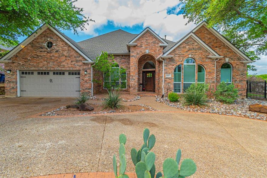 Stunning 5-bedroom home located in a sought-after golf course community within Denton ISD, perfectly situated on a spacious corner lot. This home truly checks every box on your wish list. From the moment you step inside, you’re welcomed by elegant design and high-end finishes, including rich wood flooring, soaring ceilings, and an abundance of natural light throughout. The inviting living area features a gorgeous gas fireplace, perfect for cozy movie nights, while offering beautiful views of the backyard. The gourmet kitchen is a chef’s dream, complete with stainless steel appliances, a gas cooktop, expansive counter space, stylish cabinetry, and an oversized walk-in pantry. The private owner’s suite provides a relaxing retreat with a spa-inspired bathroom, soaking tub, and an attached flex space ideal for a home office, nursery, or sitting area. Upstairs, you’ll find a convenient mother-in-law suite, perfect for guests or multi-generational living. Step outside to unwind on the split-level patio surrounded by lush landscaping, ideal for entertaining or simply enjoying peaceful evenings at home.