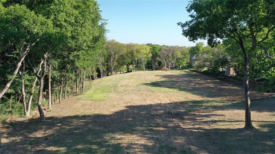 Ready to build your dream home on a spacious 1.48-acre property? Come have a look and bring your builder to this highly sought after neighborhood in the Sunrise Bay Subdivision. With limited options for new construction, this lot has been cleared and graded for a new home. The property is close to the marina, parks, shops, boat launch, Little Elm Beach and has convenient access to DFW across the Lake Lewisville toll bridge. Utilities are available, but please contact the city for any inquires on new construction. All boundaries on images are approximate and not exact, please ask agent for survey.