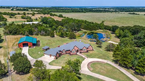 Photo of 821 Fm 406, Denison, TX 75020 (MLS # 21237305)