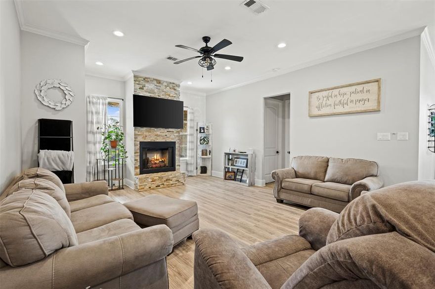 Beautifully designed 3-bedroom, 3.5-bath home with a study and open-concept floorplan. The spacious living area features a stone gas fireplace, crown molding, and recessed lighting, flowing seamlessly into a large dining area perfect for entertaining. The kitchen offers a gas cooktop, double ovens, farmhouse sink, soft-close cabinets, breakfast bar, and a walk-in pantry. The private study includes French doors, ideal for a home office.
The primary suite features a trayed ceiling and an ensuite bath with dual sinks, jetted tub, and separate shower. Each secondary bedroom includes its own ensuite bathroom, walk-in closets, and functional features such as barn doors and pocket doors. Additional highlights include a tankless water heater, a utility room with built-in cabinets and sink, an over sized 2 car garage and is located in a gated community!!