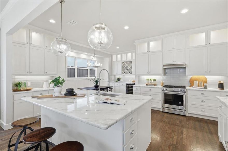 3% ASSUMABLE LOAN AVAILABLE!! Welcome to 7616 Ira Drive, a like-new home tucked into a community where pride of ownership shows. This 4 bed, 4 bath home offers a functional floorplan that lives comfortably whether you’re entertaining or enjoying everyday life. The kitchen is a true highlight, featuring modern finishes, custom cabinetry, generous workspace, high end KitchenAid gas cooking and appliances, and a layout that opens seamlessly to the main living areas making it easy to cook, gather, and host. The butlers pantry with built-in wine fridge and ice maker, large walk in pantry and breakfast room for easy living.   The home office sits at the back of the home, where you can close the doors for privacy, but still see the main living areas and backyard. This would also be the perfect playroom or homeschool space! Beautiful hardwood floors and custom fixtures and finishes throughout. The master suite has motorized shades and a huge spa like bath with an oversized tub and closet with built-ins. The master closet connects to the large laundry room for amazing convenience! There is an another bed and bath on the first floor. Upstairs is a large game room, and 2 more beds and baths. Outside, the backyard offers a manageable space perfect for relaxing, grilling, playing, less upkeep and more time living. There is space and pre-wired for a pool or outdoor kitchen. The garage is spotless with epoxy floors. Plenty of storage between the walkout attic and several oversized closets. The home is energy efficient with spray foam insulation, radiant barrier, and tankless water heaters. Location can’t be beat right off Davis, convenient access to major highways,DFW airport,shopping,dining,and everyday essentials—all while being nestled in a quiet residential setting. It’s a bike ride or walk away from Northfield Park and feeds to excellent sought after schools. This beauty is ready for its new chapter with a quick move-in available!