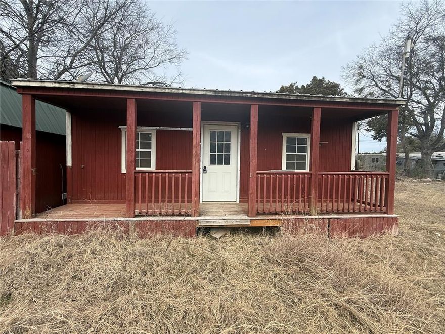 Situated on a spacious ,31 acre lot, this property offers flexibility, space, and opportunity just minutes from Lake Whitney. Featuring a tiny home, portable building, and carport, the layout is ideal for a variety of uses—whether you’re looking for a weekend retreat, rental potential, or a creative homestead setup. With plenty of room for parking, storage, or lake toys, this property caters perfectly to investors, builders, or buyers wanting a low-entry property near the lake. Located close to town amenities and just a short drive to boat ramps and recreation, this property blends convenience with potential. Opportunities like this don’t come around often—bring your ideas and make it your own.