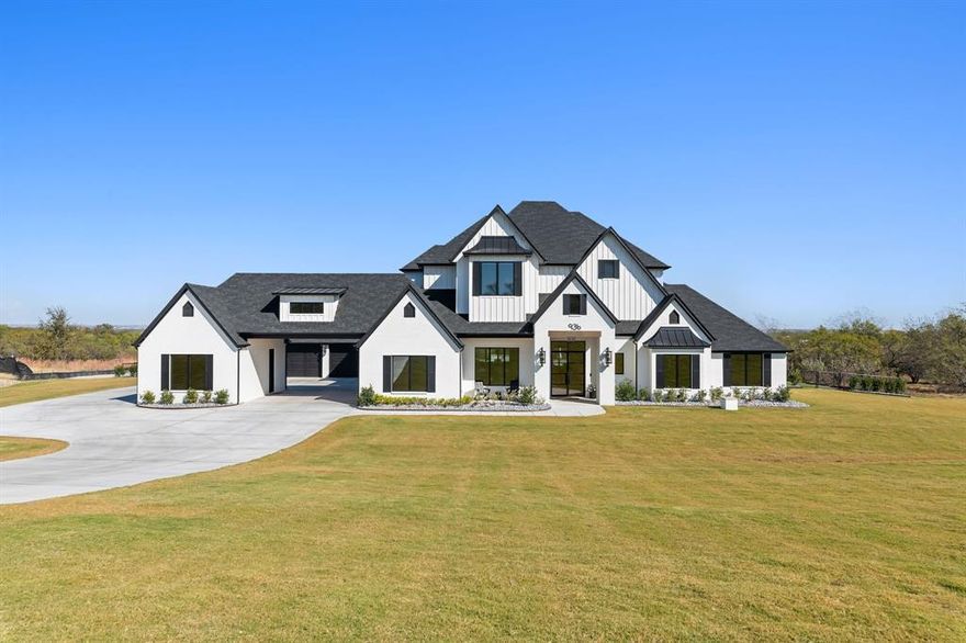 Western luxury reimagined—this 2025 custom-built residence blends modern design, superior craftsmanship, and extraordinary amenities to create one of Aledo’s most remarkable offerings. Homes of this caliber in La Madera are rare, and this property sets a new standard.

Situated on nearly 3 private acres with expansive Texas views, this 5,700± SF home is designed for elevated living and effortless entertaining. The thoughtful layout includes 5 bedrooms and 6 bathrooms, along with a detached mother-in-law suite or office with a full bath, ideal for multigenerational living or a flexible workspace.

An impressive 4-car garage with extra-wide porte-cochère introduces the home’s grand presence. Inside, no detail was spared—from custom white oak cabinetry throughout, designer wallpaper, and curated lighting selections, to white oak engineered wood floors, Pella windows, and designer tilework enhancing every space.

The interior transitions seamlessly to an outstanding outdoor living area, complete with electric screens, a fireplace, full outdoor kitchen, and generous covered living space—perfect for year-round enjoyment.