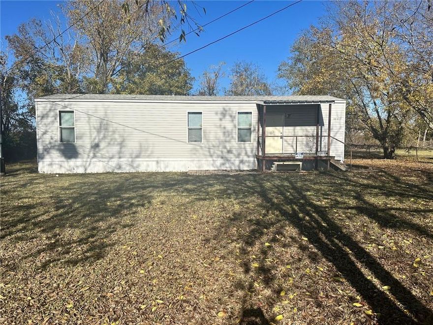 Super cute move in ready home. Home was built in 2016, Bought brand new, not lived in till 2019 by one occupant until 2024. Home features 2x6 exterior studs, double pain windows, built in fire alarm-sprinkler system, has central heat and air, free standing range and refrigerator. Also features handy Cap accessible bathroom and large fenced lot with trees. Built in dressers.  New Survey on file. Identical home next door in lessor condition appraised for $113K and sold June 2025.