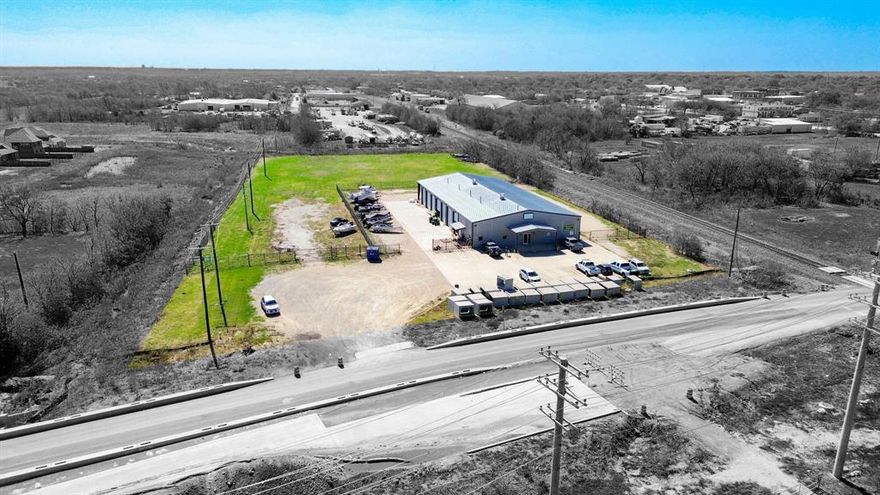 We are pleased to present the opportunity to acquire a 10,575-square-foot flex property in the fast-growing community of Sanger, Texas. The building features a retail-warehouse configuration with a front storefront offering a reception area, private office, kitchenette, and ADA-compliant restroom, connected to a spacious warehouse designed for operational versatility. The warehouse includes a single-bay section with two 14-foot electric grade-level doors, a 3,000-square-foot mezzanine, shop restrooms, and a main area with twelve 12’x14’ manual doors, a smaller rear roll-up door, gas heating units, and dual firewalls. Ceiling heights range from 15 ft. (wall) to 22 ft. (center), with a rear awning and wash bay drainage capability for added functionality. Situated on 3.974 acres (±2.45 acres in floodplain), the fenced site provides ample paved and gravel areas for secure outdoor storage. Zoned Light Industrial, the property is ideal for owner-users in automotive, boat-RV, or equipment sales and service, contracting, or light manufacturing. Located just half a mile from Interstate 35, the site offers convenient access to major transportation routes and nearby retail, making it a strong operational and investment opportunity in the expanding North Texas market.