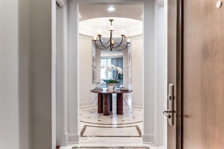 Welcome to the  Ritz, like no other, this custom unit offers an elegant entry that leads to a breathtaking great room with panoramic city views. With spacious living in mind this floor-plan is perfect for entertaining on a grand scale. The chef's kitchen is a dream, featuring an oversized island, high-end Wolf and SubZero appliances. The primary suite is large and truly impressive, with a closet that is the center of all envy at the Ritz.  A private screening lounge  completes the spacious design home, making it the epitome of luxury and style. The Ritz Carlton is renowned for its 5-star service and offers an upscale, maintenance-free lifestyle. Residents can enjoy concierge services, room service, valet, a spa, fitness center, and pool. Located in the vibrant Uptown neighborhood, this property is within walking distance to The Crescent, Klyde Warren Park, CBD, Victory Park, American Airlines Center, and a variety of excellent shopping and dining options