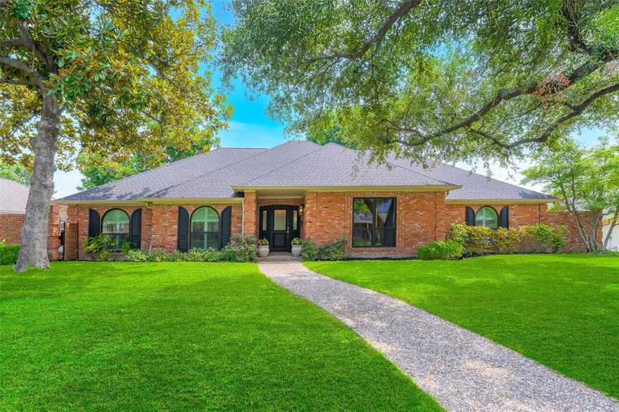 Welcome to 6606 Regalbluff Drive, where timeless elegance meets modern luxury. This stunning residence has been fully renovated from the kitchen to bathrooms to pool, offering a light, airy ambiance with wide-plank light wood flooring throughout. Generous living spaces with new floor to ceiling windows (2024) provide picturesque views of the pristine pool and patio area.  The chef’s kitchen is a showstopper with sleek custom cabinetry, quartz countertops, marble backsplash, and premium stainless steel appliances including a gas cooktop and double oven—perfect for both daily living and entertaining. A private courtyard off of the kitchen allows easy access for grilling or a convenient herb garden.  Primary bedroom offers a tranquil retreat, complete with a sitting area, and large ensuite bath. Secondary bathrooms have all been transformed into spa-like escapes with contemporary fixtures, designer tile, and clean, sophisticated finishes. Step outside to your private backyard oasis. A sparkling updated pool is surrounded by lush turf landscaping, creating a low-maintenance yet vibrant setting. Practice your short game on your very own putting green, or relax poolside under the Texas sun. Located in a sought-after neighborhood of Prestonwood, this home combines high-end design, functionality, while conveniently located with access to major highways and destinations. Updates listed in transaction desk include flooring, windows, plumbing, resurfaced pool, and in addition to Preferred Lender offering 1% credit for rate buy down. Amazing opportunity!