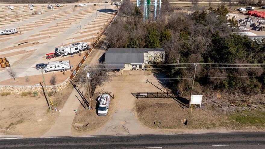 Prime Commercial Investment Opportunity! 700 S Interstate Highway 45, Ennis, TX

Discover an exceptional commercial property with high-visibility frontage along one of Ennis’s most dynamic growth corridors. Situated directly off I-45 with immediate exposure to thousands of daily commuters, this property presents a rare opportunity for owner-users and investors alike.

This lot features a 2,540 sq ft well-built shop and workshop warehouse on approximately 0.20 acres, ideal for a wide range of business uses like automotive servicing, retail storefront, fabrication shop, warehouse storage, mixed-use office, or service-oriented business!

With spacious work areas with durable concrete flooring, a fully finished office space, two bathrooms, and versatile layout options to support business operations from day one. With central heating and cooling and robust metal construction, your business can operate efficiently and comfortably year-round.

Benefit from exceptional daily visibility and potential customer flow. The site sits just steps from the popular Buc-ee’s travel center, with an estimated 7,800+ vehicles passing daily.

Strong Investment Potential – Positioned in a rapidly expanding commercial corridor with substantial growth momentum.

Versatile Building Use – Perfect for auto repair, warehouse operations, office showroom combo, contractor base, or mixed industrial activities.

High Traffic Counts & Visibility – Close proximity to major highway traffic maximizes marketing exposure and customer reach.

Affordable Entry Point – Competitive pricing for a fully functional commercial property with strong long-term equity potential.

Don’t miss your chance to own a highly visible commercial property in Ennis, TX with strategic highway frontage, versatile workshop space, finished offices, and strong investment upside. Schedule a tour today and unlock the potential at 700 S Interstate Highway 45.