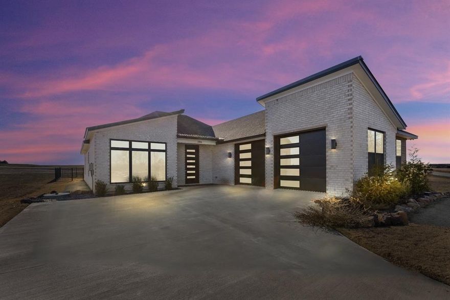 SELLERS ARE OFFERING BUYERS UP TO $10,000 TOWARD RATE BUY-DOWN OR CLOSING COST ASSISTANCE! Luxury living in prestigious Rock Creek Resort! Live the good life in this stunning home nestled within the highly sought-after Rock Creek Resort, a top-ranked golf community featuring a championship course designed by the renowned Jack Nicklaus Design Group. Residents enjoy exclusive amenities, including a gated entrance, private boat ramp, marina, community pool, clubhouse with a restaurant, pro shop, activity trails, and more! Designed for modern living, this energy-efficient, foam-insulated home offers an inviting open-concept layout, perfect for entertaining. The chefs kitchen is a showstopper, featuring high-end Cafe appliances, a propane gas double oven range, a built-in drawer microwave, quartz countertops, a spacious island, abundant cabinetry, and a pantry. The luxurious primary suite is conveniently located off the living room and offers a spa-like retreat with dual sinks, a soaking tub, a separate shower, and an oversized closet that is connected to the laundry room. Secondary bedrooms and a full bath are separate from the primary suite. Need extra space? A versatile bonus room can serve as a home office, formal dining, or second living area. Step outside to the covered back patio, complete with a built-in grill, sink, and mini fridge, ideal for outdoor gatherings. This exceptional home is a must see! Make your appointment today!