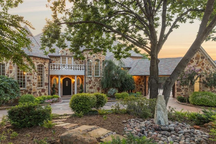 An amazing opportunity on this newly completed full-home remodel in the exclusive gated lake community of Point Noble. Situated on a 1-acre private cul-de-sac lot, this 7-bedroom estate and separate apartment suite was reimagined for luxury living with everything today’s buyers are looking for. Added features include a regulation indoor basketball court with three adjustable hoops and electric scoreboard, which can second as a regulation volleyball or pickleball court. A fully equipped workout gym with large storage and bath connect directly to the basketball court and large veranda for seamless workout-to-relaxation. The 20-ft foyer has floor-to-ceiling windows framing the resort-style backyard, where tiered pools, a hot tub, fire pit, covered veranda, outdoor kitchen, and stone fireplace create an entertainer’s dream. A whole-home generator provides automatic backup power to the entire property ensuring uninterrupted comfort. Inside, newly refinished hardwoods flow throughout, and a fully reconfigured chef’s kitchen is equipped with new high-end appliances, oversized island, and designer lighting. The primary suite emphasizes spa-like living with a freestanding tub beside the fireplace, an 11-ft deep steam shower, heated floors, coffee bar, full living room adjoining the sleeping quarters, and two separate dressing areas with ample storage including a hidden closet system. The home’s thoughtful layout features both upstairs and downstairs laundry, dual staircases, and on the main level a private guest suite offers its own spacious walk-in shower and closet. Additional highlights include a recently installed slate roof, top-tier media room, wine cellar, dry bar, private office with bonus workspace, and an additional exterior sport court, full interior paint update, and all covered porches featuring Phantom screens. With room for additional 8-car parking, this home offers privacy, luxury, and modern ease in one of the area’s most tranquil lake communities.