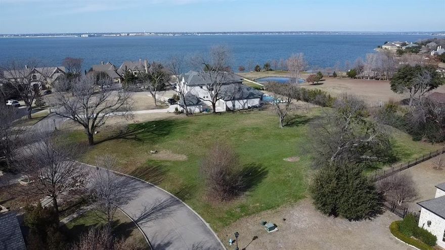 Rare Opportunity to Build Your Dream Estate in Exclusive Terrabella!
Enter a world of pure nature amidst some of the most refined homes and estates in Heath, TX, this property offers an ideal canvas for creating your exclusive lakeside estate!
It's your chance to secure the LAST homesite in the prestigious Terrabella waterfront community, an enclave of ONLY TEN estates valued in the $$$Millions$$$, offering breathtaking views of Lake Ray Hubbard. These homes capture the magic of living near the most calming element on earth. Situated on a 1-acre homesite, this exquisite property provides the perfect setting for your dream home, with a minimum requirement of 5,000 sq. ft. of air-conditioned space. For reference, a neighboring lot at 6 Terrabella Lane sold for $2,000,000 in April 2024, underscoring the exceptional value and exclusivity of this community. Experience luxury living with Heath's highly rated schools, located in the sought-after community of Rockwall, TX, often awarded by Money Magazine as one of the top ten places to live, and within a 35-minute drive to the working hubs of Dallas and Collin Counties, convenience meets serenity.