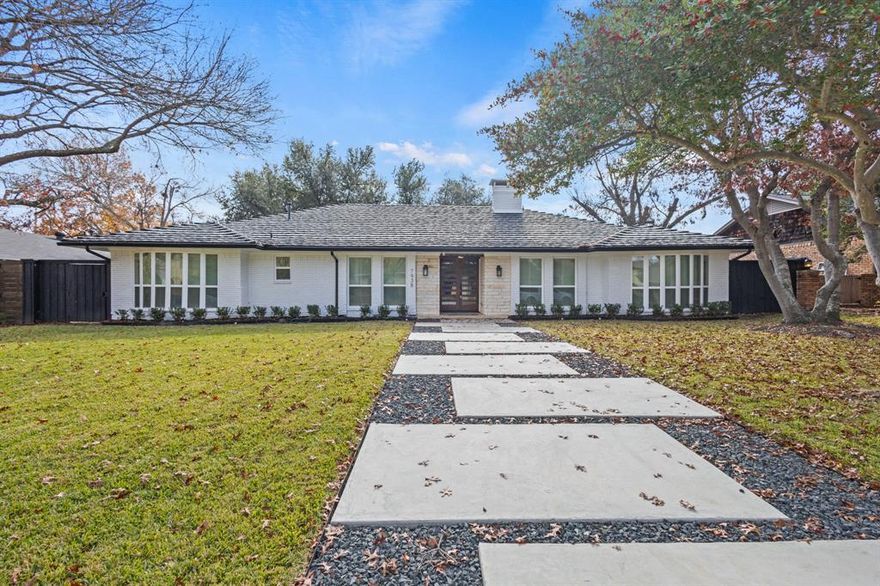 Situated at the quiet end of a cul-de-sac in the heart of North Dallas’ sought-after Spring Creek neighborhood, this fully remodeled residence offers exceptional privacy with minimal through-traffic. Designed for modern living, the light-filled interior showcases vaulted ceilings, open living spaces, and refined finishes throughout. The thoughtfully designed floor plan features four spacious bedrooms, three beautifully updated bathrooms, a game room, and an additional flex space, ideal for both everyday living and entertaining.

The private primary suite provides a serene retreat with double closets and a spa-inspired en suite bath featuring dual vanities, a soaking tub, and a separate shower. The kitchen has been fully refreshed and appointed with brand-new appliances, including a refrigerator and dishwasher, a five-burner gas cooktop, and Taj Mahal quartzite countertops with a full-height backsplash, creating a sophisticated and timeless focal point for the home.

Upstairs, the staircase leads to an expansive game room with built-in cabinetry, complemented by an additional bonus room—perfect as a home theater, private office, or flexible living space. Outdoors, the expansive backyard is framed by mature trees and lush landscaping, offering open patio areas for relaxed gatherings and outdoor enjoyment.

A rear-entry garage with an attached covered carport adds both convenience and functionality, while additional highlights include updated flooring throughout, a durable aluminum slate roof, and a peaceful setting at the end of the street. Enjoy walkable access to nearby schools and neighborhood amenities, with quick connectivity to major thoroughfares and downtown Dallas—delivering a rare blend of privacy, flexibility, and understated luxury in one of North Dallas’ most established communities.