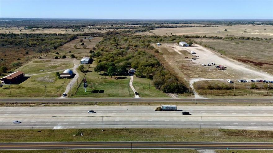 Prime Opportunity to Acquire just under 6 Acres of IH45 Frontage for your growing business or investment portfolio!! This property sits on the IH 45 service road that allows for 2 way travel both North and south past the property. Great visibility from the Highway! Sitting just outside the city limits of both Corsicana and Angus, helps the appeal for easy development and flexibility on future use. Bordering the property directly to the north is the 160 Acre master planned IH45 Industrial park, bringing growth and industry to the area. This location and ease of access from both IH45 and Highway 31 would be perfect for any type of shop space needing a yard, light industrial & flex warehouse space, but certainly not limited to any of those uses and is here for your business and ideas. Property currently has a Billboard lease in place for immediate income, term is up in 2026, so the new owner can choose to renegotiate or terminate the agreement. Great property, Great location, and easy to develop!