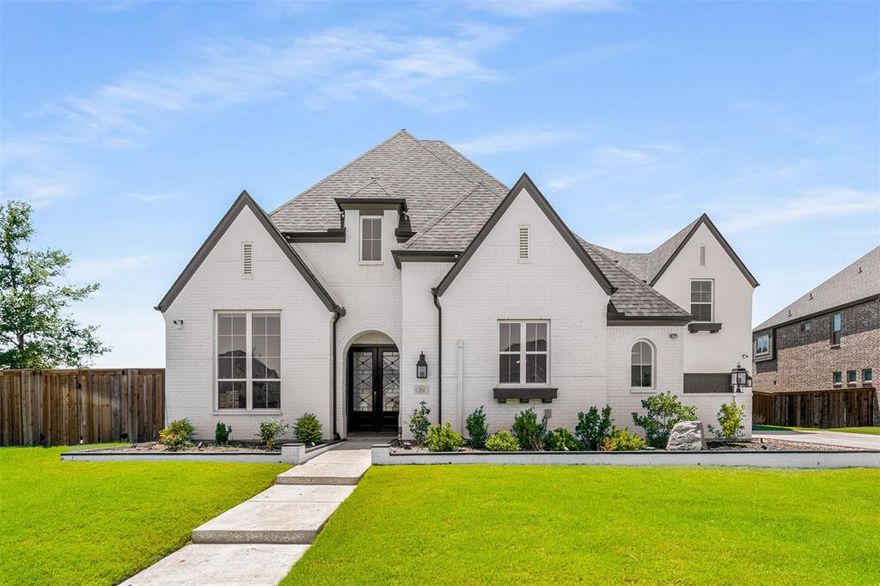 Luxury Living in Prestigious M3 Ranch, 5 Bedrooms, 5.1 Baths. Welcome to this stunning custom luxury residence located in the highly sought-after M3 Ranch community-one of Mansfield’s most desirable master-planned neighborhoods. Surrounded by scenic walking trails, greenbelts, and resort-style amenities, this exceptional home offers the perfect blend of elegance, comfort, and modern living. Step inside to discover a thoughtfully designed floor plan featuring soaring ceilings, expansive windows that fill the home with natural light, and designer finishes throughout. From beautiful specialty tile flooring to custom cabinetry and premium quartz countertops, every detail has been carefully selected for both style and functionality. The home features two gourmet kitchens, each equipped with professional-grade appliances and a spacious waterfall island-perfect for entertaining or multi-generational living. The luxurious primary suite serves as a private retreat, complete with a spa-inspired bath showcasing a soaking tub, overhead rain shower, and an oversized walk-in closet. Designed for today’s lifestyle, the home also offers multiple flexible living spaces including: Private study, Media room and Upstairs game room. Enjoy outdoor living on the extended covered patio with ample for parties and family gatherings. Residents of M3 Ranch enjoy a true community lifestyle with access to an amenity center, scenic open spaces, and top-rated Mansfield ISD schools, all just minutes away. Conveniently located near shopping, dining, and major highways, this home combines luxury and location in one of the fastest-growing areas in DFW. This home was expanded beyond the original builder footprint, to offer enhanced space and functionality for exceptional everyday living.