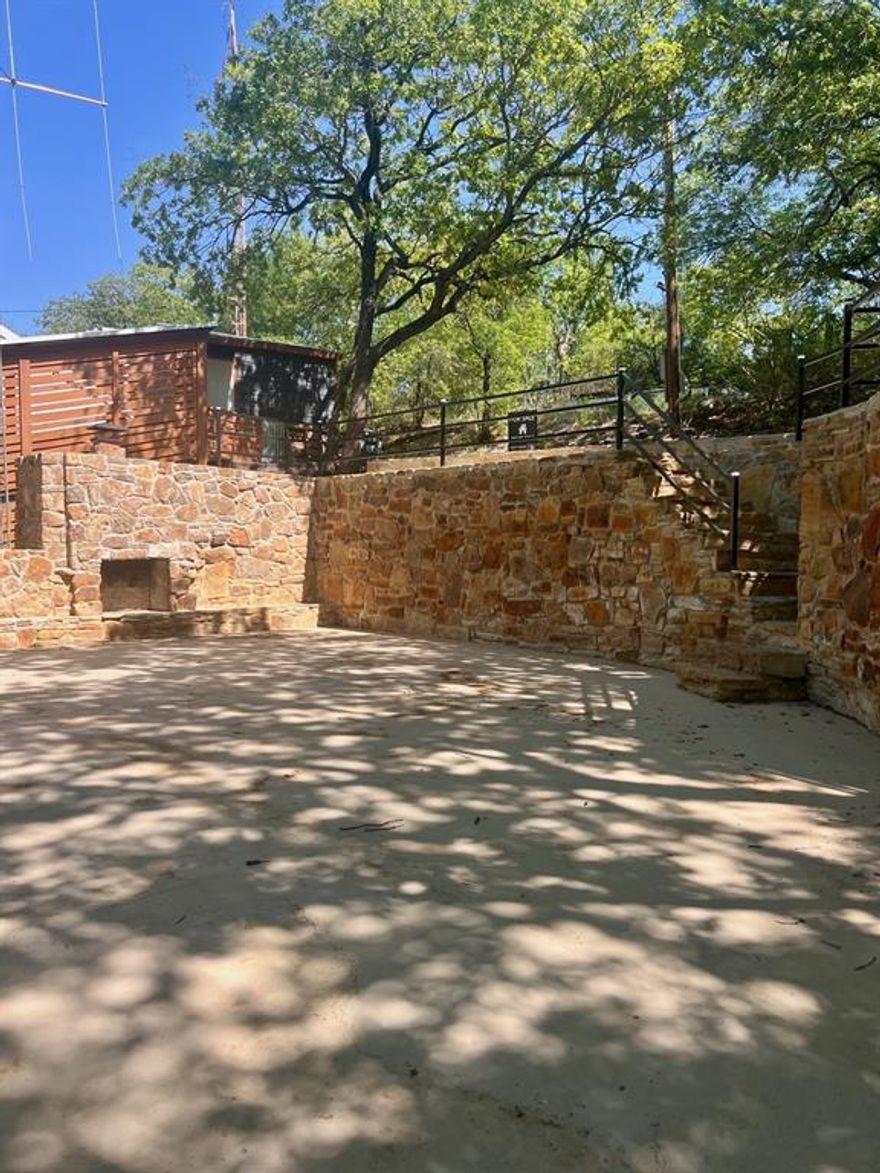 **Two-Tiered Lakefront Property with RV Parking & Covered Boat Dock**
Experience the ultimate weekend getaway with this two-tiered lakefront property that is laid out perfectly for both relaxation and entertaining.The shaded patio features an outdoor fireplace, creating an inviting space to gather with friends and family after a day on the water, or to simply unwind while taking in peaceful lake views. Boating enthusiasts will enjoy easy access to the lake from their covered boat dock in 30 ft deep water and with no HOA restrictions, this property offers the freedom to customize and enjoy as you wish. This lakefront gem is a rare opportunity that is located in the highly desirable Three Fingers Cove on the north end of Lake Bridgeport.