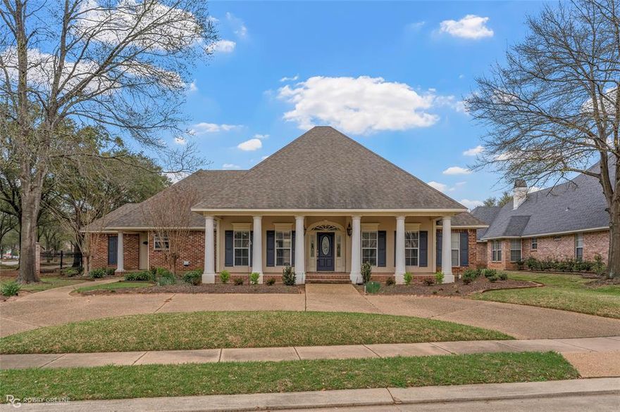 Stunning property nestled on a corner lot in the gated Oak Alley neighborhood. The circular front drive, large columned porch, and well-maintained landscaping offer a great first impression as you arrive. Inside, the attention to detail throughout is apparent from the ornate crown molding to the cased windows and elegant light fixtures. The formal dining flows seamlessly into the formal living space with wood flooring to bring warmth and high ceilings to make it feel open and airy. The modern kitchen features a center island, granite counters, and plenty of cabinet space while the breakfast nook offers room for more informal meals. The family room or den off of the kitchen includes built-in cabinets and tile floors that provide easy maintenance for the more relaxed space. Each of the bedrooms are spacious, ensuring plenty of room for guests or family alike. The bonus room upstairs with its own full bath offers flexibility to suite your needs, whether that's a media room, game room, or additional bedroom. Additionally, the garage is 2 cars deep on one side with built-in cabinets in the back, perfect for your projects! Conveniently located near I220 for easy travel, WK Bossier, and local shopping and dining - don't wait, schedule your tour today!