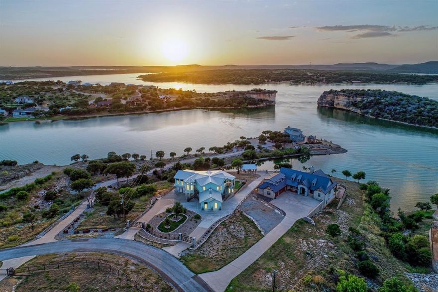 COASTAL VIBE ESTATE ON THE ONLY PRIVATE SANDY BEACH INSIDE LANDMARK HELLS GATE!  Pull up in your yacht and jump out onto private sandy beach with huge, covered shoreline cabana. Wide concrete driveway up to multilevel estate with room for future pool next to lovely cabana with more gorgeous views. Inside, two huge living areas with kitchens, bedroom suites, large outdoor living spaces ON SEPERATE FLOORS.  Excellent floorplan to entertain guests while enjoying complete privacy. INSIDE ELEVATOR! Top grade appliances & exotic granite islands Two Master suites w lux bathrooms. Lovely library, double bunk room, gym equipment w view. Turnkey NEW PRO COSTAL DECOR, fine art, luxury furnishings. Solid white oak herringbone floors, glass & porcelain tile, extensive woodwork & moldings throughout plus 3 fireplaces. Sleeps 16 or more, 4 garages, fenced, circular drive, iron gates. Community amenities & airport. VRBO? YES, and First Class Marina close-by VISIT HellsGateLuxuryBeachHouse. c o m