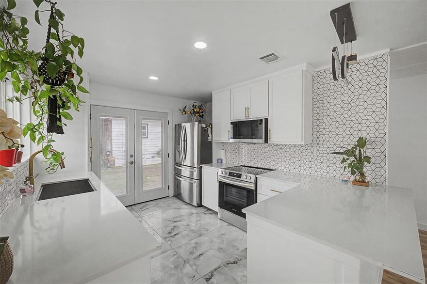 Recently renovated and move-in ready, this charming 2-bedroom, 1-bath home offers incredible value in Fort Worth! Featuring an open-concept layout, stylish new LVP flooring, and a beautifully updated kitchen and bathroom, every detail has been thoughtfully refreshed. Major systems are already taken care of with a roof and HVAC approximately 4 years old. Plus, enjoy the added bonus of a detached workshop with electricity and a fully renovated studio apartment (approx 400 SF) —perfect for guests, rental income, or a private office. A well-cared-for home with so much to offer—don’t miss it!