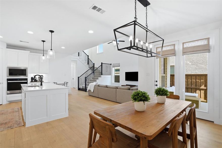 Nestled in the wonderful neighborhood of Ventana is this beautifully designed home offering a thoughtfully crafted living space. Step inside to discover an open-concept layout filled with natural light, highlighted by soaring ceilings and expansive living areas that create an airy, inviting atmosphere. The spacious living room flows seamlessly into a stunning kitchen featuring a large island, abundant cabinetry, and sleek finishes—ideal for everyday living and entertaining alike. Designed with flexibility in mind, the home offers generously sized bedrooms and abundant storage throughout. Upstairs, additional living space overlooks the main floor, enhancing the home’s open feel and offering a perfect area for relaxation or work-from-home needs. The primary suite is a true retreat, complete with two spacious closets, providing exceptional organization and convenience. Enjoy outdoor living under the covered patio, perfect for gatherings or quiet evenings, with a low-maintenance yard that complements today’s busy lifestyle. Located near highly rated Rolling Hills Elementary, this home offers both comfort and convenience in a desirable Fort Worth location. Perfectly suited for a multi-generational household, this home combines functionality, comfort, and modern style. A great opportunity to own a spacious, well-appointed home designed for modern living—you will love this home for years to come.
