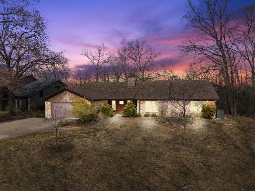 LAKE FORK WATERFRONT brick home with a 2-stall boat house and fishing dock. This large 2913 sf home is perfect for the fishing enthusiasts. Situated on famous Long Branch known for its great fishing area, i.e.: bass, catfish, crappie, is a fisher’s delight. There are 3 bedrooms, 2 baths and a half bath in the Utility Room. Primary bedroom features a private bath with 2 lavatories. The 2 bedrooms are Jack and Jill type with 2 lavatories. The large Living Room, approx. 25x20 is open to the Kitchen and Dining room. It features a wood-burning fireplace with wood stacking space while wood paneling adds a warm and comfortable environment. Kitchen has breakfast bar, nice appliances, wood counters and cabinets. It opens to Family and Dining Room with built-in hutch. Utility Room features washer and dryer, storage area, built in cabinets with counter for folding, plus half bath and lavatory. A very special feature is the approximately 59x11, 626 sf sunroom with wall of windows that enhances an uninterrupted water view of the  boat house and Lake Fork. At the end of Sunroom is an 8x11 storage room with large safe that stays. A community boat launch for homeowners is at the end of the cul-de-sac. There is an HOA aimed at protecting the integrity and value of the subdivision. Situated in subdivision of 22 homes, all waterfront. Lots are deeded with adjacent Leaseback to Lake Fork from Sabine River Authority. All measurements are approximate, see 2D floor plan attached. Buyer to verify all information.