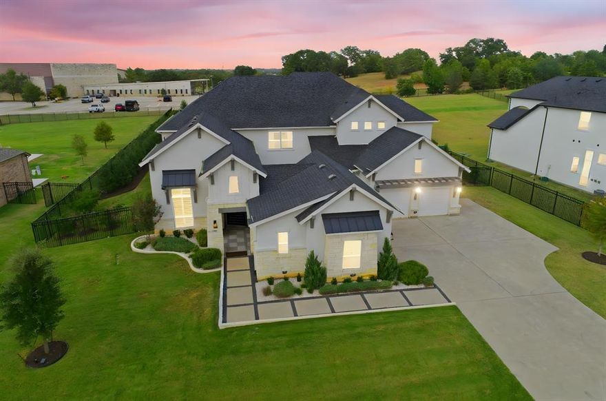 Experience open-air living at its finest in this stunning Toll Brothers home designed to fit every lifestyle.
The central courtyard features a covered outdoor dining space, perfect for gatherings with family and friends. The great room opens to both the courtyard and the back patio through fully screened dual sliding doors, creating a seamless indoor-outdoor flow and resort-style entertaining.
Highlights include a private den, a gourmet kitchen with an island and dining area, a first-floor guest suite with a full bath, and a luxurious primary suite with a spa-inspired bathroom and large walk-in closet.
The 4-car garage features an epoxy-coated floor, while two private gates leading to the front entry provide both beauty and added security.
Enjoy the comfort of a whole-home water filtration system, thoughtfully installed in the garage to provide clean, purified water to every corner of the home. Upstairs offers a spacious game flex room and a media room surrounded by three bedrooms, each with its own full bath.
The expansive backyard is a private oasis, featuring a modern, fully lit swimming pool framed by beautifully manicured trees.
Enjoy the perfect combination of elegance and comfort in the prestigious Town Lake community of Flower Mound.
