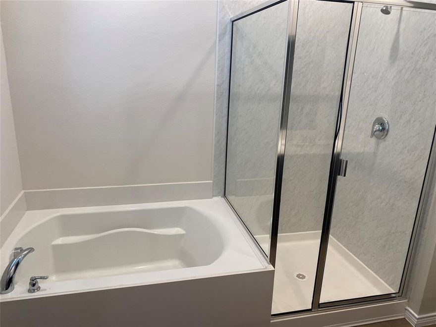 2 yr old freshly painted,3 bedroom 2.5 bath .DR Horton Townhome . The townhome boasts a open concept floor plan . The kitchen has all stainless steel appliances with quartz counter tops .First floor flooring is all luxury vinyl plank . The second floor is carpeted Utility room is on the second floor with a full washer and Dryer . All bedrooms are on the second floor with 2 full bath. The Master bath includes double sink a soaking tub and a separate shower. The Garage has extra height making it convenient to have some extra storage . Steps away from walking trail and stores.